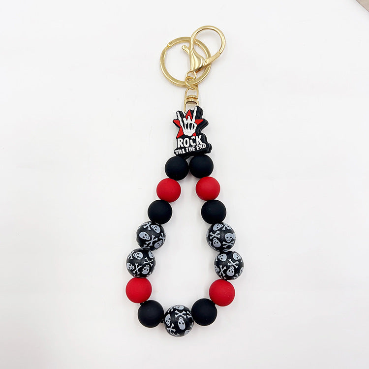 Wholesale Silicone Pumpkin Cow Ghost Dog Paw Wooden Bead Bracelet Keychain